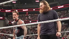 CM Punk and Sami Zayn suffer a surprising loss after the former WWE Champion gets destroyed by returning star