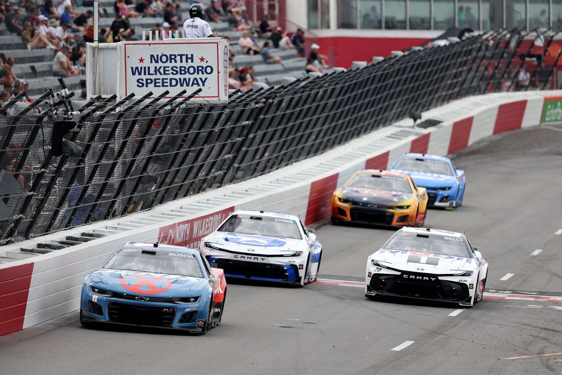 NORTH WILKESBORO, NORTH CAROLINA - MAY 16: Kyle Busch, driver of the #8 SENIX Chevrolet, Ty Gibbs, driver of the #54 Sirius XM Toyota, and Christopher Bell, driver of the #20 Mobil 1 Toyota, drive during practice for the NASCAR Cup Series All-Star Open and All-Star Entries at North Wilkesboro Speedway on May 16, 2025 in North Wilkesboro, North Carolina. (Photo by David Jensen/Getty Images) - Source: Getty