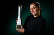 Jelena Ostapenko poses with the 2025 Porsche Tennis Grand Prix trophy (Source: Getty)