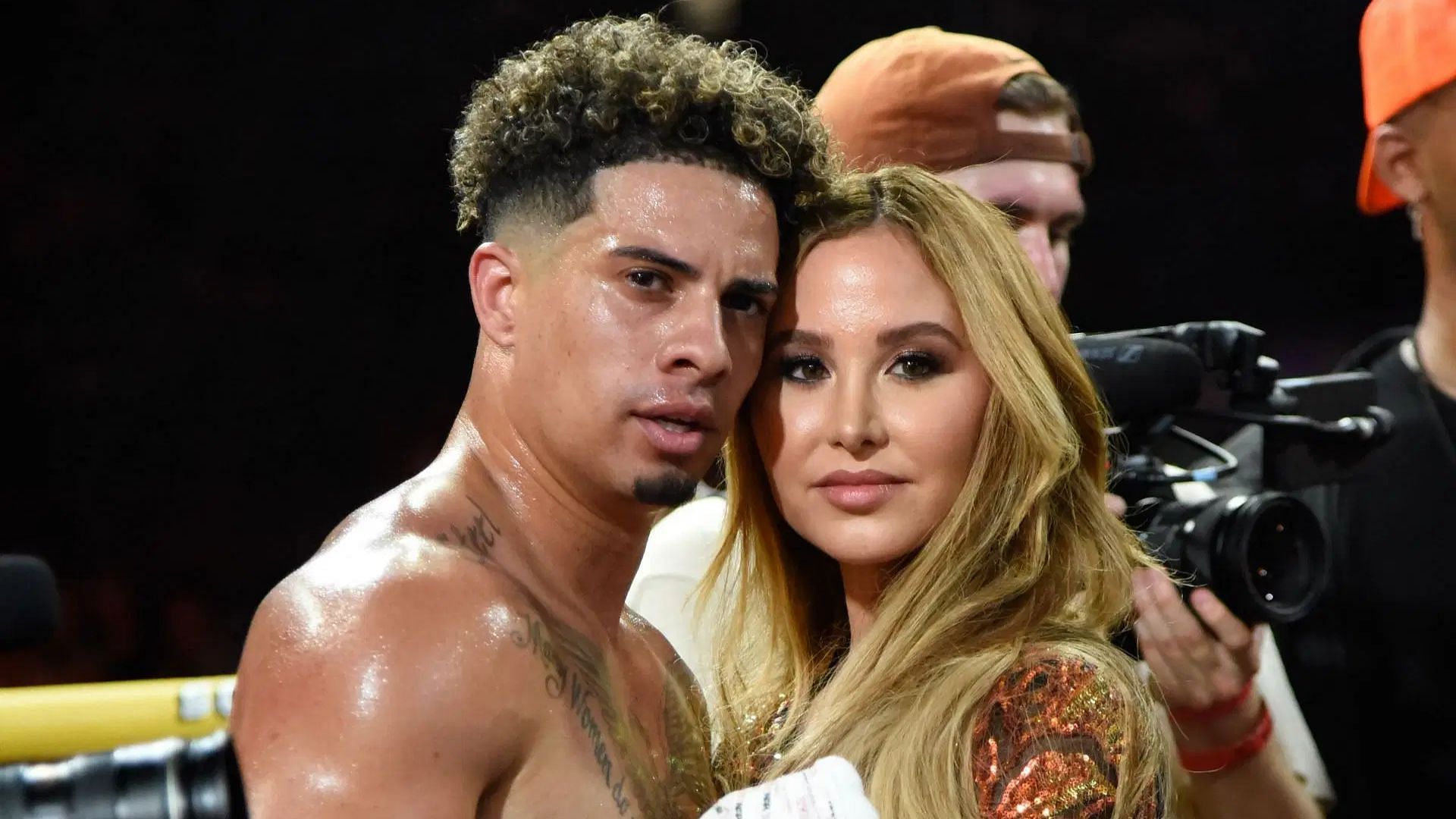 Catherine Paiz and Austin McBroom after he won his match during LiveXLives Social Gloves (Image via Getty)