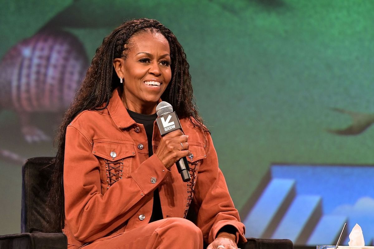 Michelle Obama spotted dancing with Beyoncé's mother Tina Knowles while filming an episode of her IMO podcast in front of a live audience