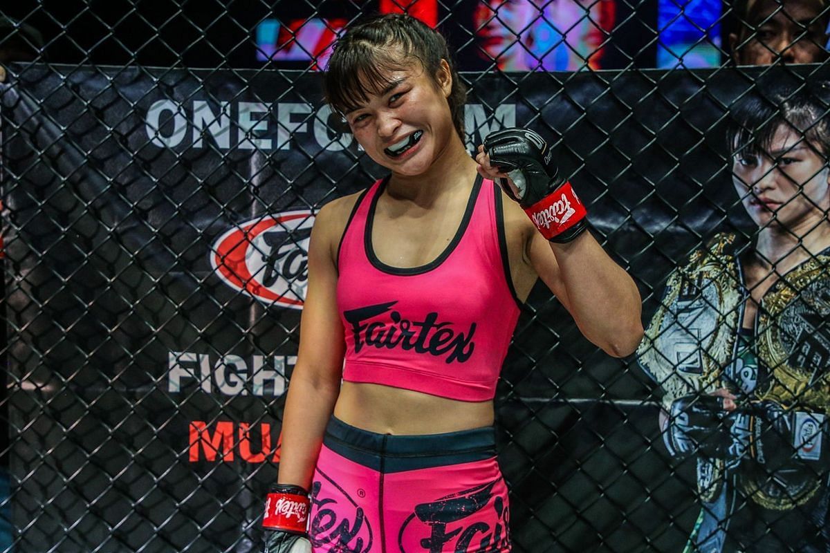 Stamp Fairtex in a black and pink getup