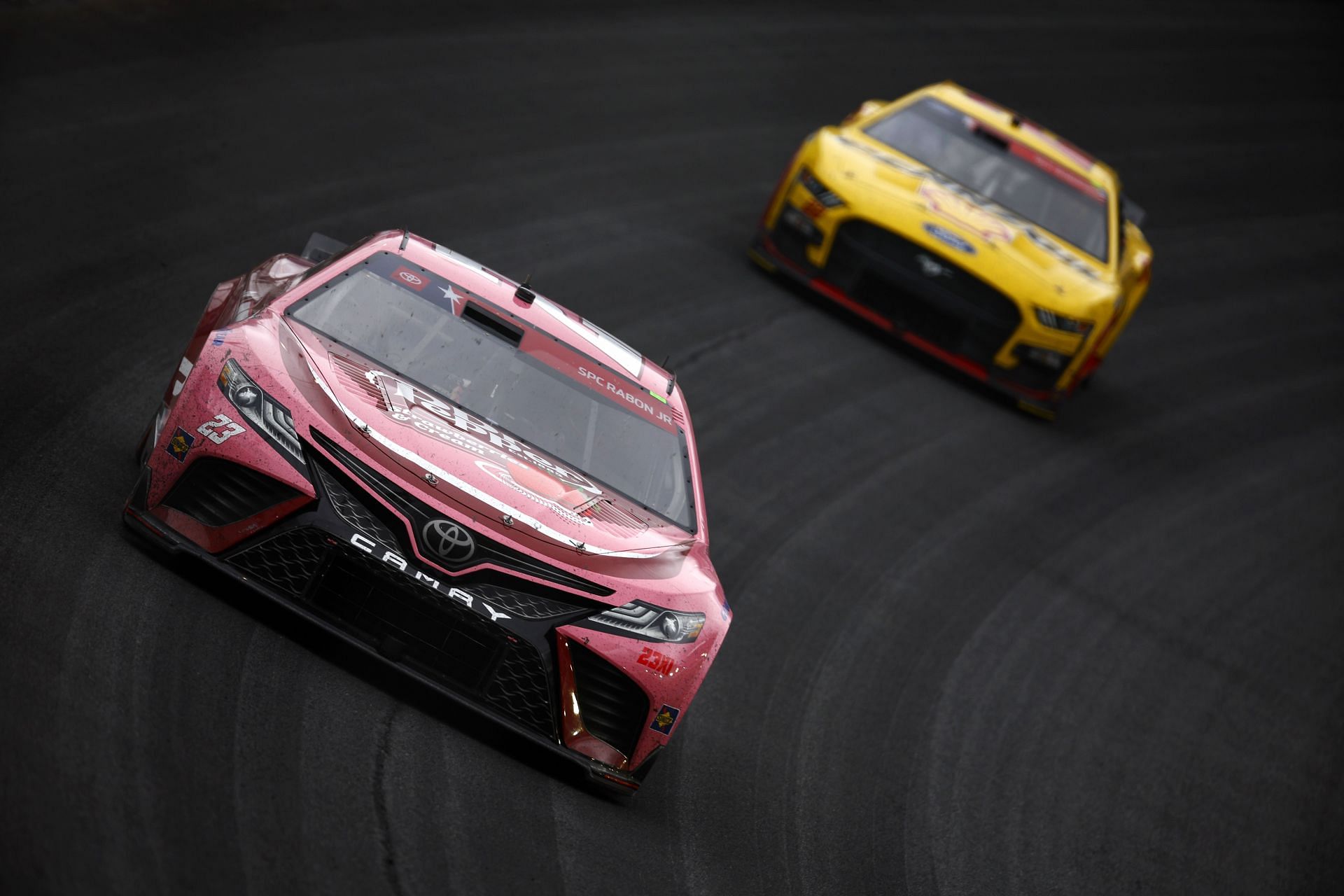 CONCORD, NORTH CAROLINA - MAY 29: Bubba Wallace, driver of the #23 Dr Pepper Strawberries &amp; Cream Toyota, leads Joey Logano, driver of the #22 Shell Pennzoil Ford, during the NASCAR Cup Series Coca-Cola 600 at Charlotte Motor Speedway on May 29, 2023 in Concord, North Carolina. (Photo by Jared C. Tilton/Getty Images) - Source: Getty