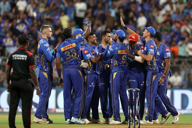 Mumbai Indians pacer and wife spotted having a chat in team bus following IPL 2025 suspension [Watch]