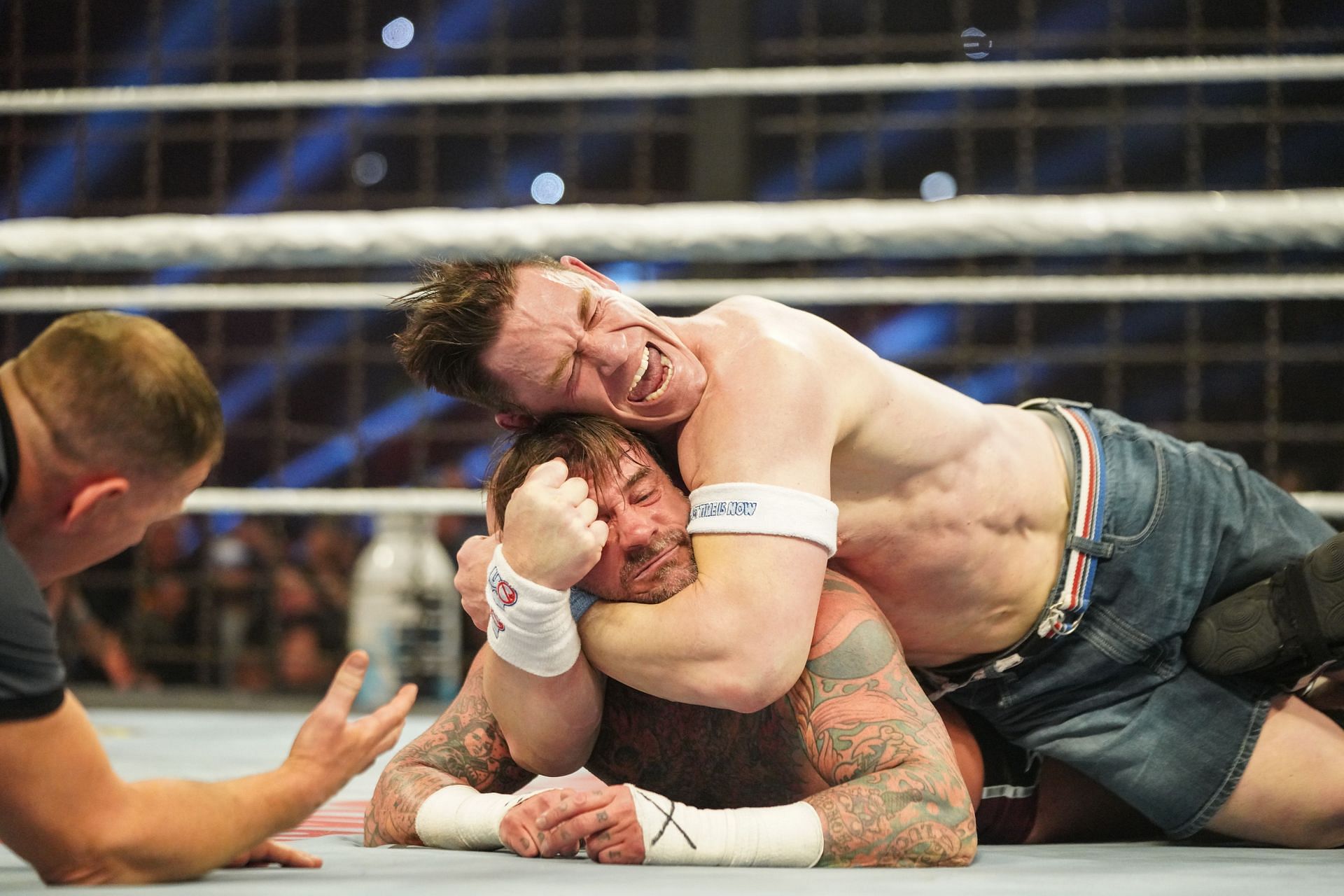 CM Punk & John Cena at Elimination Chamber - Source: Getty