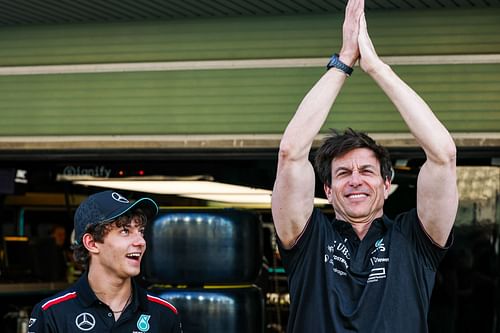 Mercedes GP Executive Director Toto Wolff applauds in the pitlane as Andrea Kimi Antonelli looks on - Source: Getty