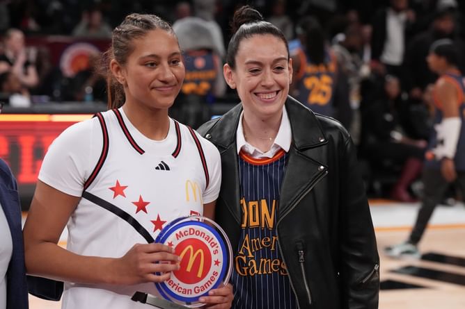 Photo: UCLA star Lauren Betts' sister Sienna Betts gets presented with the Naismith All-American first team jersey