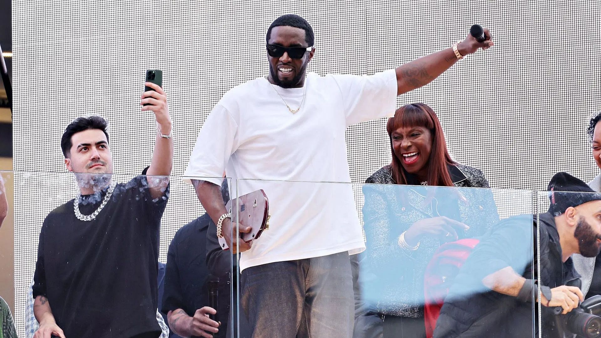 Sean &quot;Diddy&quot; Combs speaks to the crowd after being presented with the key to the city by New York Mayor Eric Adams (Image via Getty)