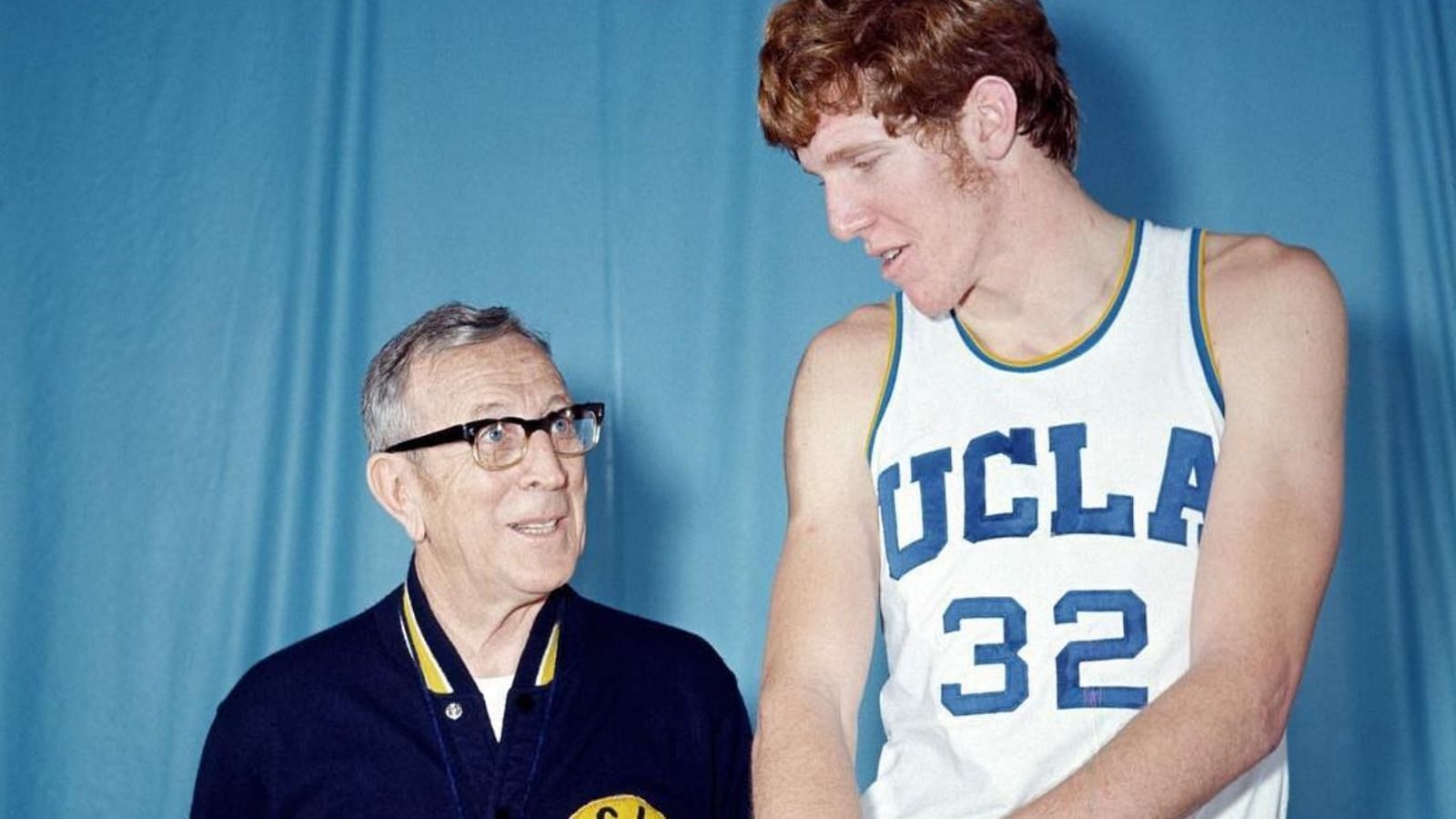 John Wooden alongside Bill Walton