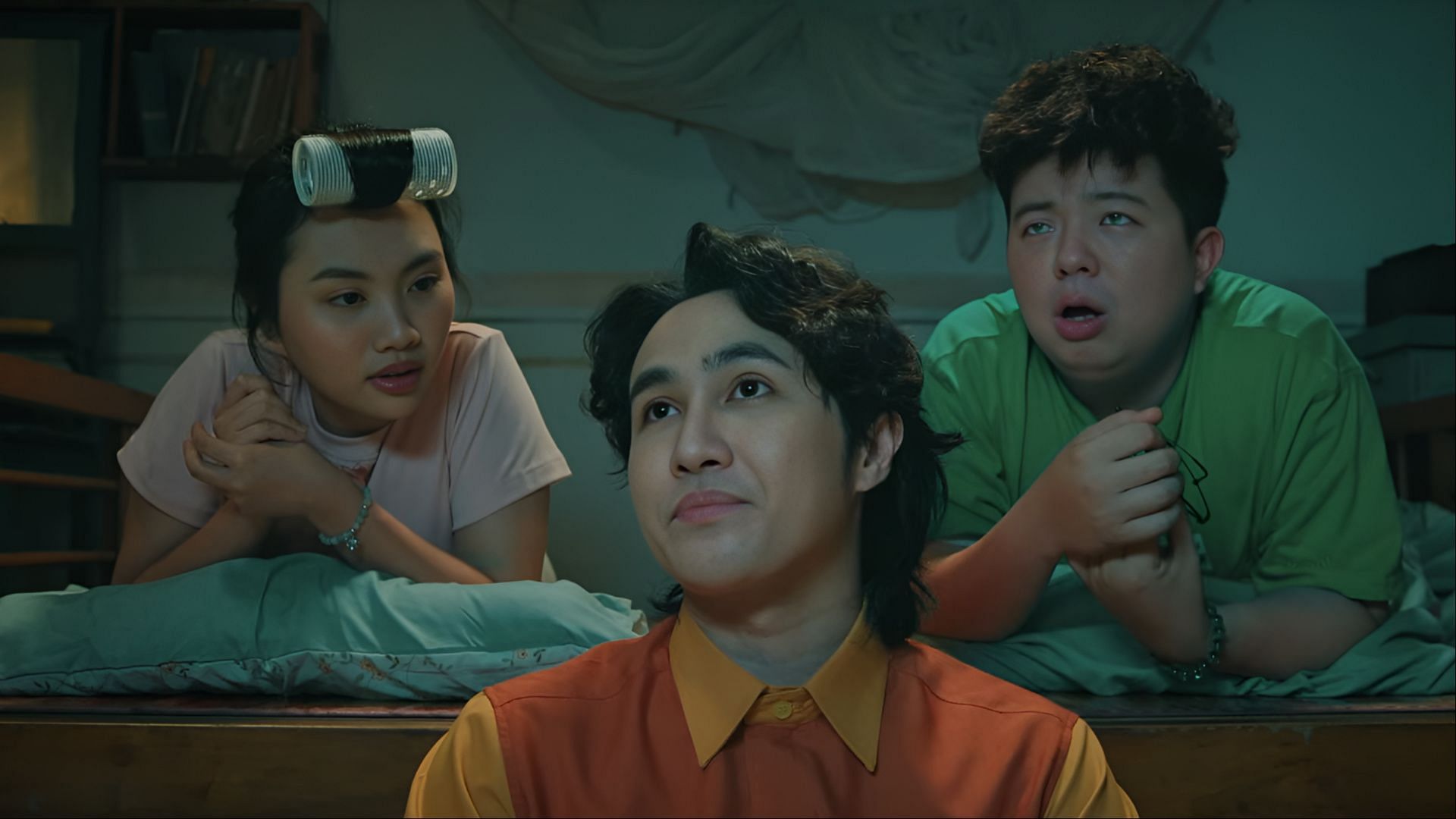 My Tien, Gia Minh, and a cousin gather late at night, uncovering secrets of their ancestral legacy. ( Image via Skyline Media)