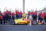Alex Palou and his CGR team celebrate with the Borg-warner trophy after winning the 109th Indy 500 - Source: Getty