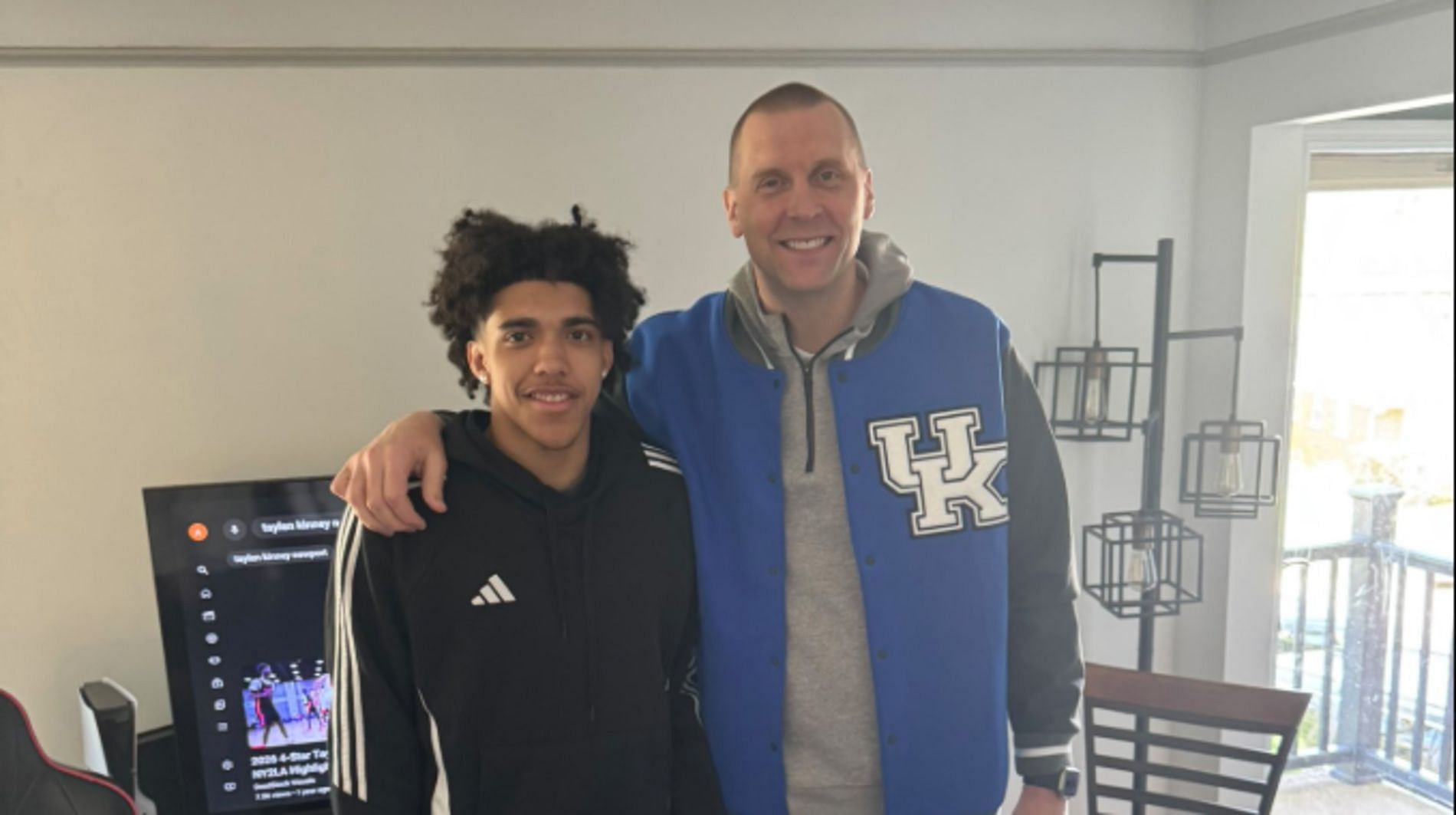 Taylen Kinnety with Mark Pope (Source: X/ @Taylen_0)