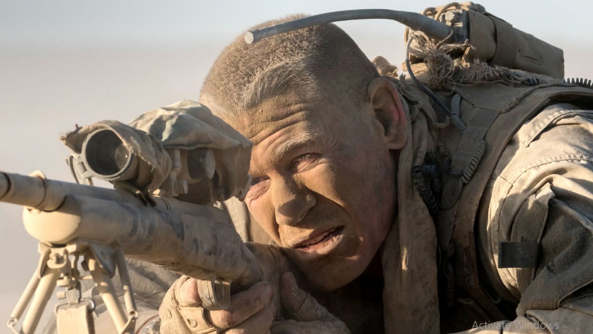 John Cena portrays the role of anAmerican soldier attacked by an Iraqi sniper (Image via Apple TV+)