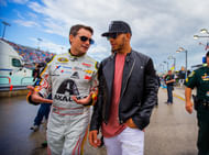 Jeff Gordon (left) walks with Formula One driver Lewis Hamilton before the Ford EcoBoost 400 at Homestead-Miami Speedway, November 22nd 2015 - Source: Imagn