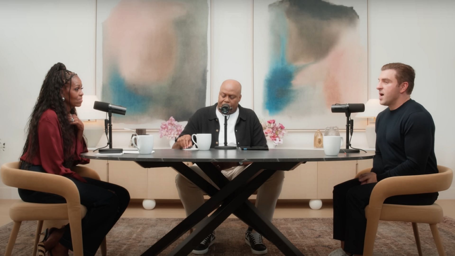 Michelle Obama, Craig Robinson, and Brian Chesky at the IMO podcast (Image via YouTube/@MichelleObama)