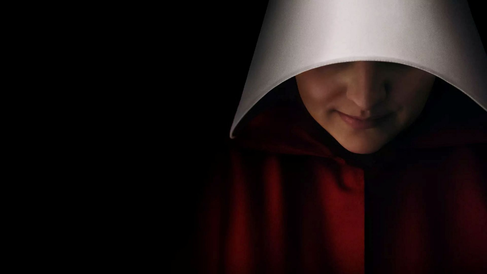 Elisabeth Moss as June in The Handmaid