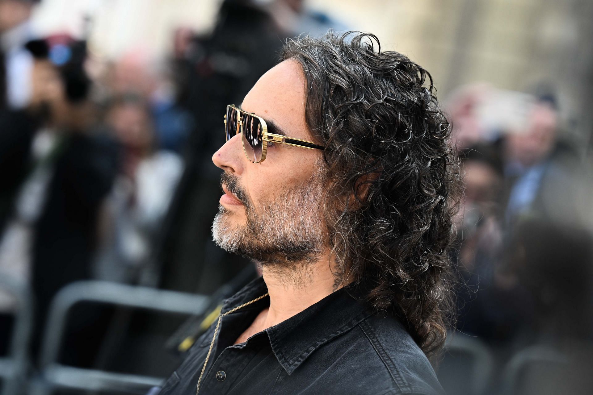 Russel Brand appears at court in London on rape and assault charges - Source: Getty