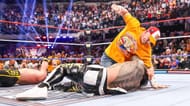 John Cena attacking Jey Uso. (Image credits: wwe.com)