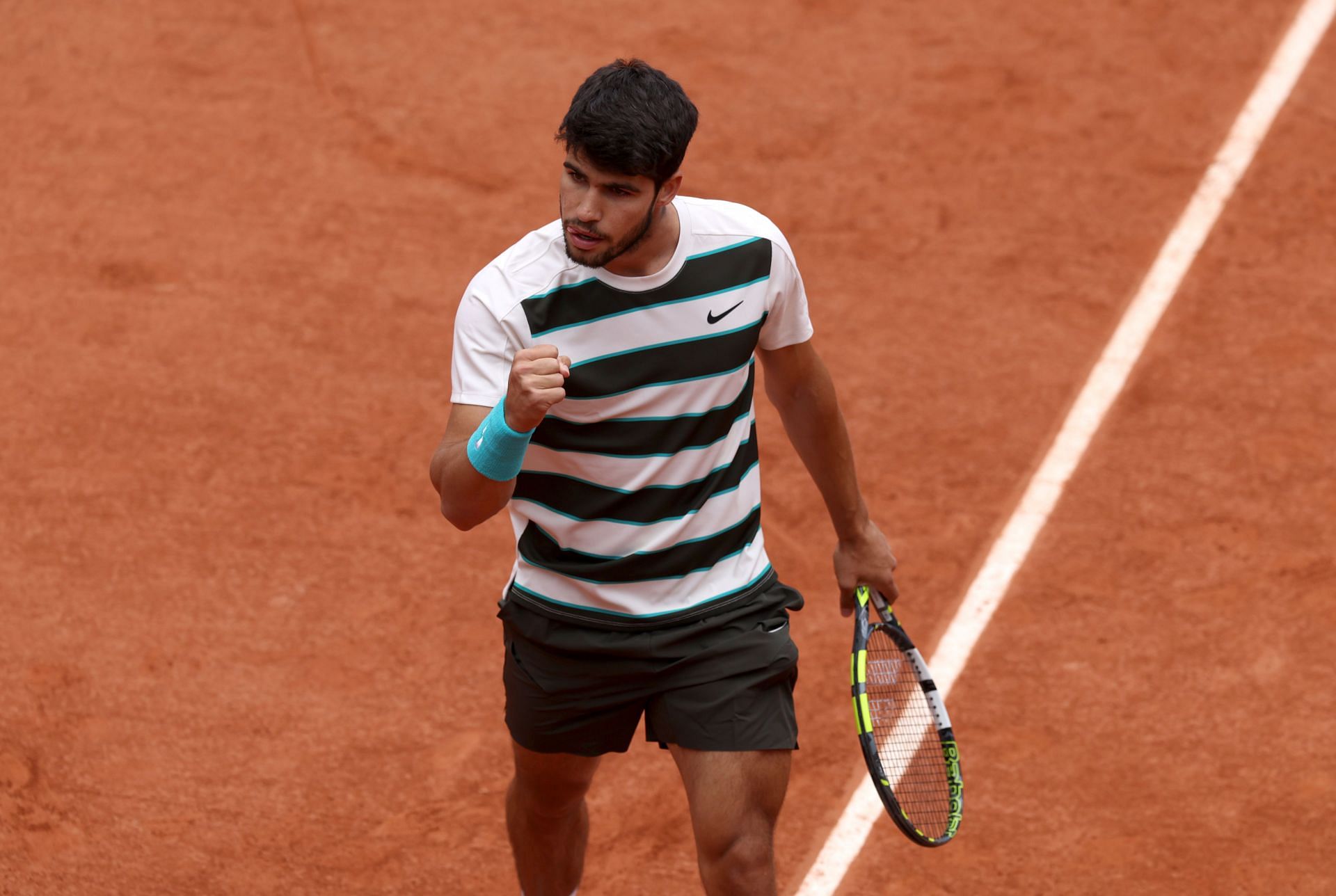 Carlos Alcaraz celebrates a point against Giulio Zeppieri in the pair&#039;s men&#039;s singles first round clash at the 2025 French Open (Source: Getty)