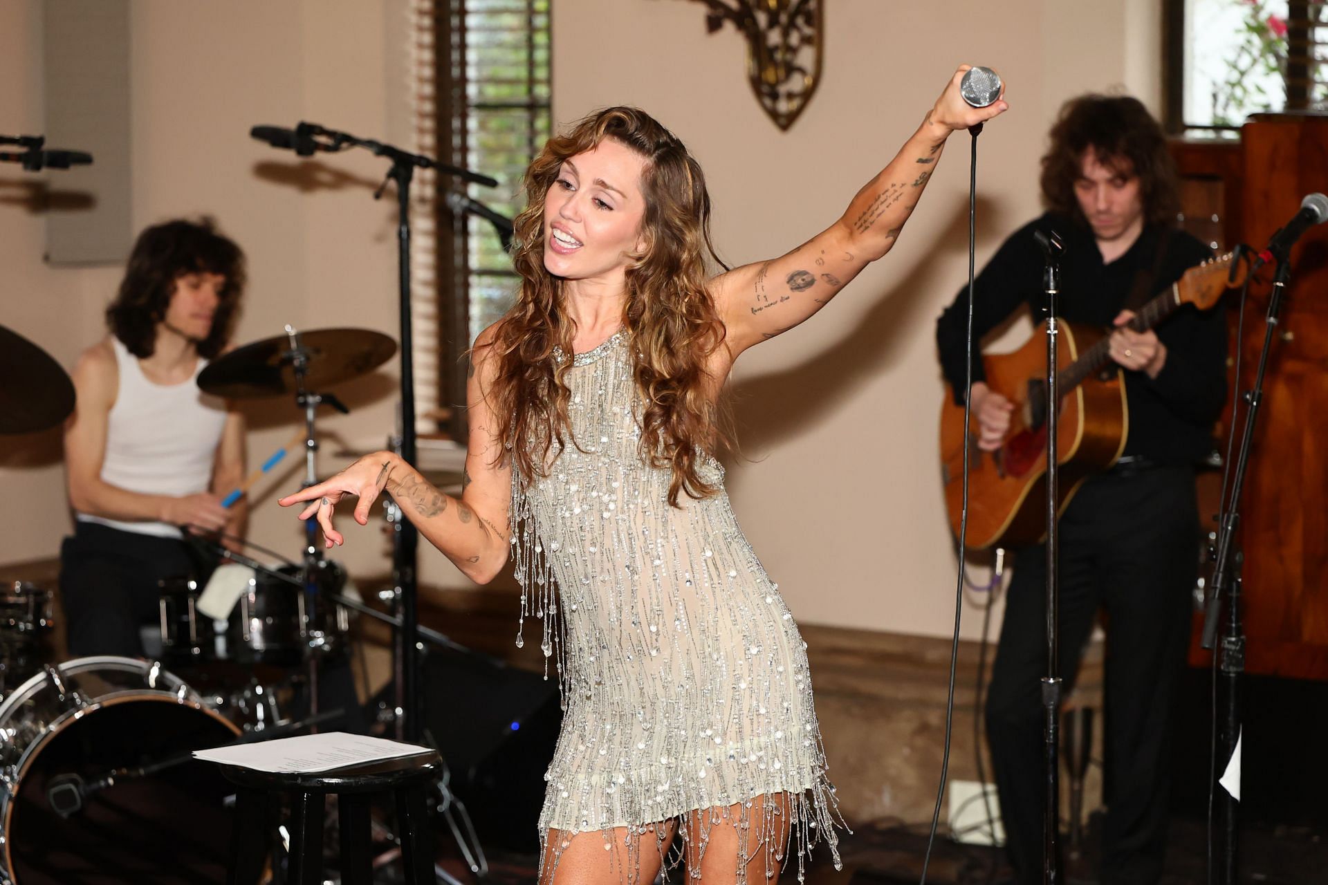            Miley Cyrus performs during &#039;Something Beautiful&#039; album release event at Chateau Marmont on May 27, 2025. (Image via Getty)