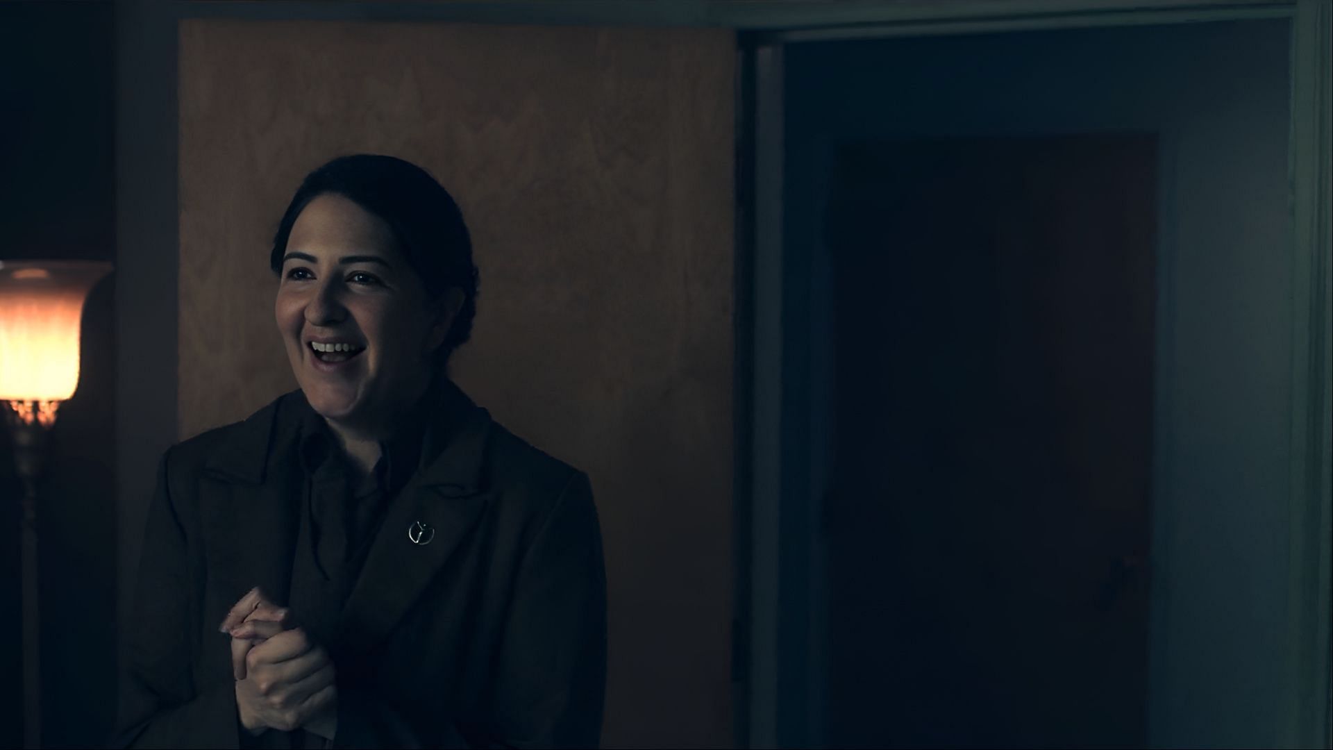 Aunt Phoebe’s joy feels out of place, yet intentional, as she navigates a dangerous game in The Handmaid's Tale. (Image via Hulu)