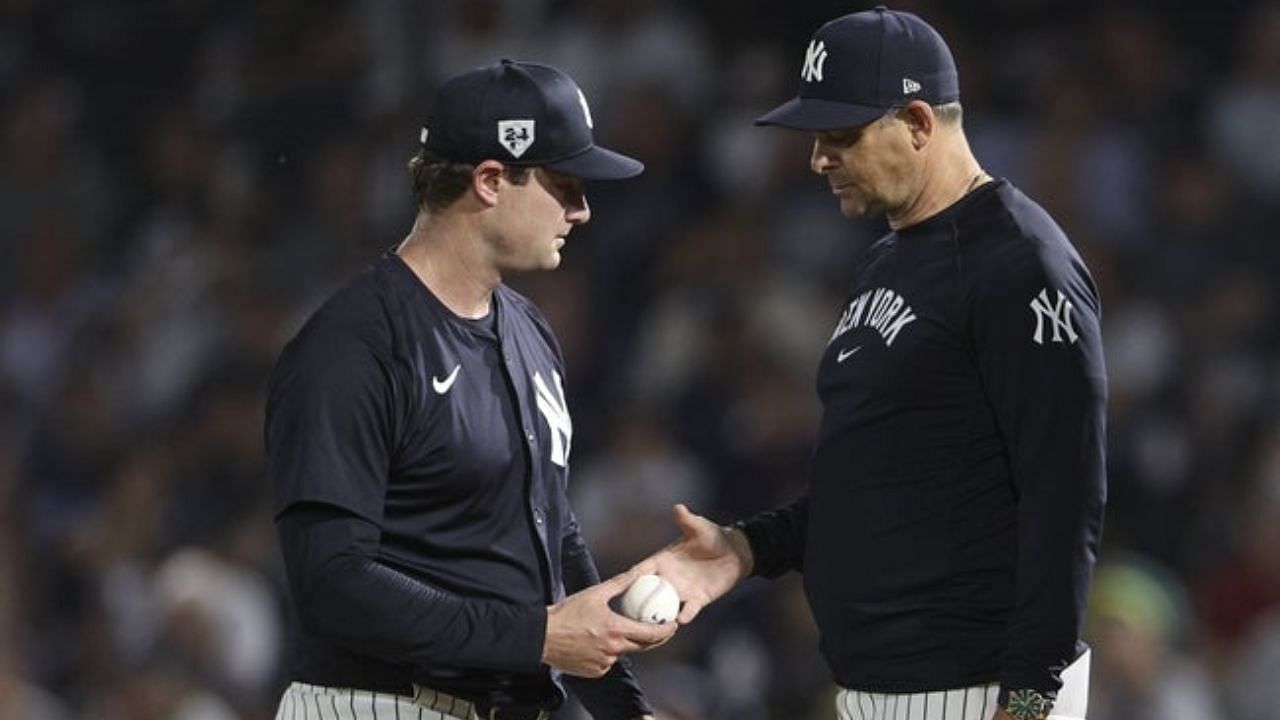 Gerrit Cole and Aaron Boone [Source: Imagn]