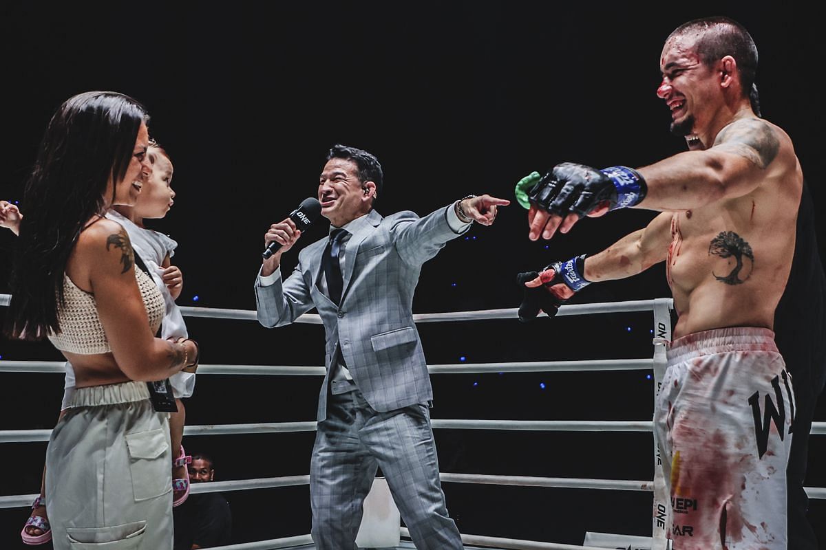 Lucas Gabriel (R) proposes to the love of his life | Image by ONE Championship