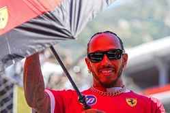 Lewis Hamilton spotted cosying up to an unknown woman in the club after Monaco GP