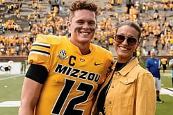 Brady Cook's fiancée Carli beams with pride as Jets QB's sister Ellie graduates from Missouri State University
