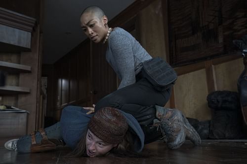 Nora holding down Ellie in The Last of Us season 2 (Image via HBO)