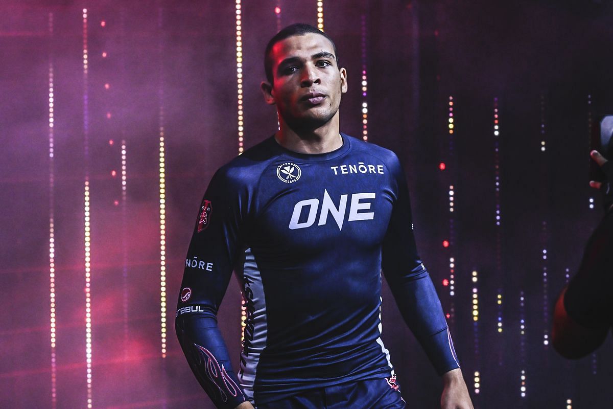 Tye Ruotolo in a black ONE rash guard, standing in the Circle