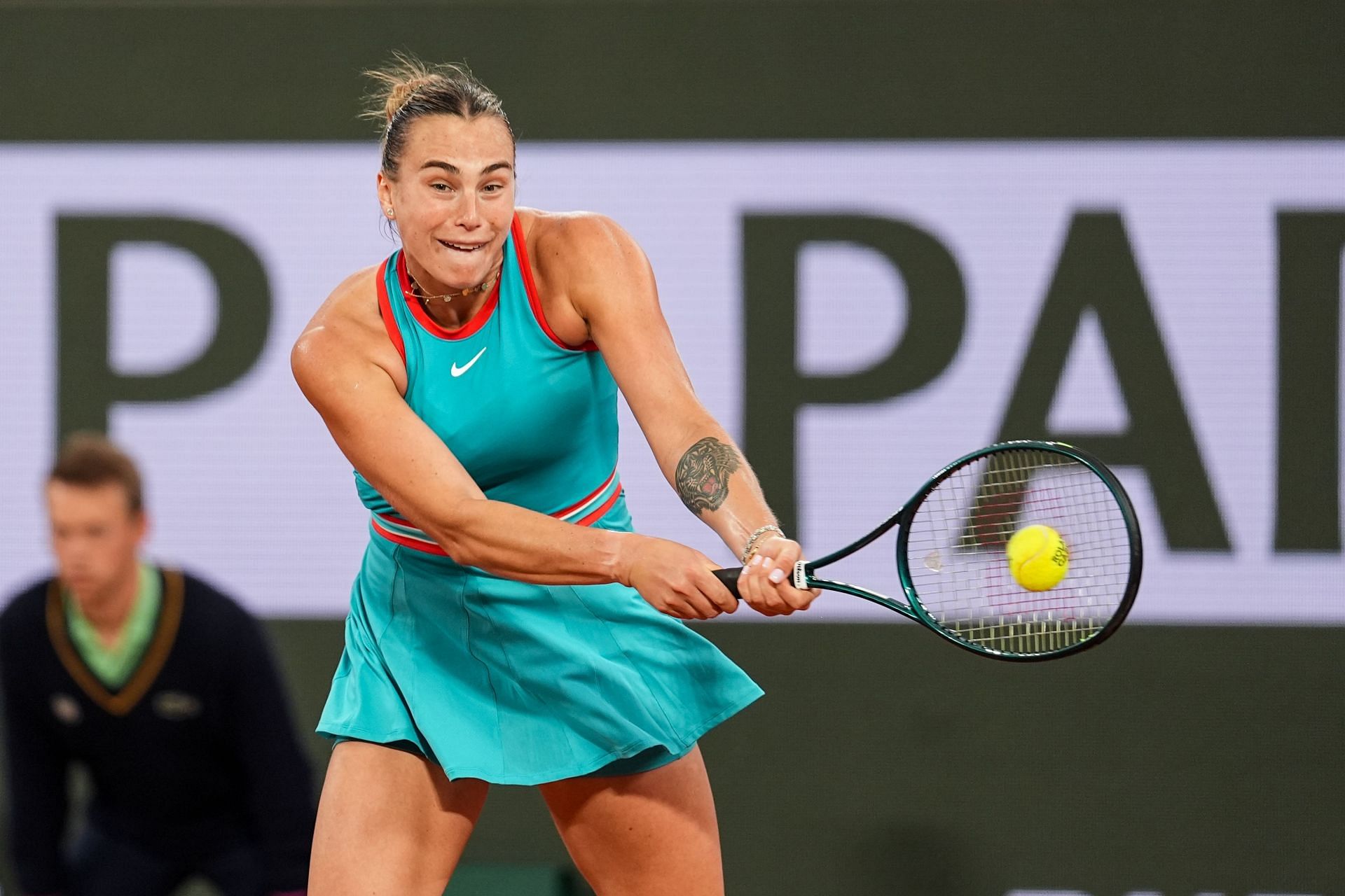 Aryna Sabalenka hits a backhand during French Open 1R win | Image Source: Getty