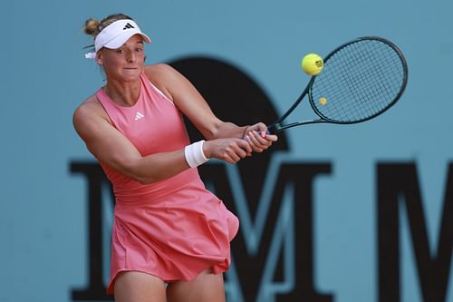 Krueger plays a backhand in the Mutua Madrid Open - Day Two - Source: Getty