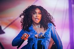 "Kim K influence can’t be denied" — Netizens react to SZA balancing a champagne bottle on her butt to celebrate her AMAs win