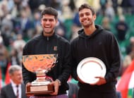 Carlos Alcaraz (left) and Lorenzo Musetti (right) during the 2025 Monte-Carlo Masters' trophy presentation ceremony (Source: Getty)