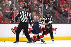 WATCH: Brad Marchand ejected for short scrap with Shayne Gostisbehere after latter fired puck at Panthers veteran
