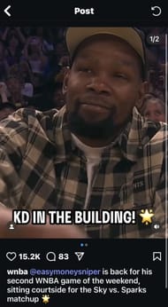 Kevin Durant sits courtside at the Los Angeles Sparks game