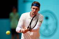 Bublik plays a backhand in the Mutua Madrid Open - Day Eight - Source: Getty