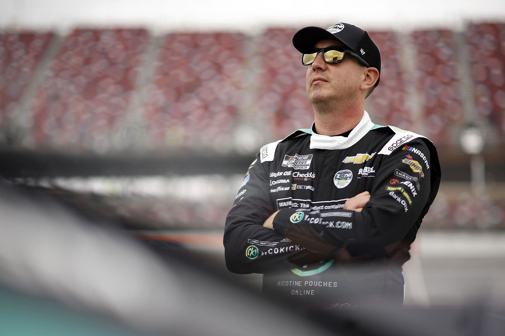 TALLADEGA, ALABAMA - APRIL 26: Kyle Busch, driver of the #8 Nicokick Chevrolet, looks on during qualifying for the NASCAR Cup Series Jack Link