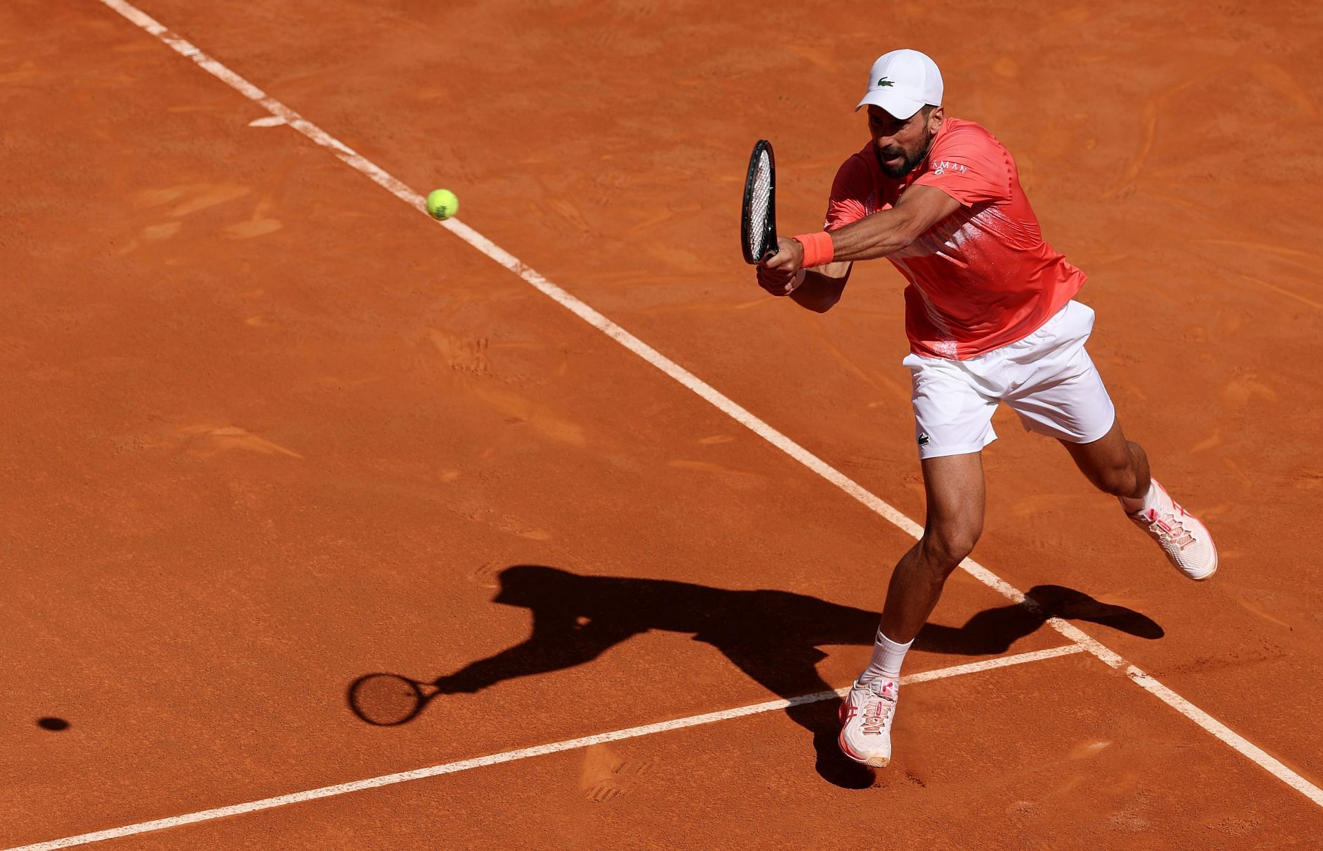 Djokovic plays a heavy backhand on tour - Image Source: Getty
