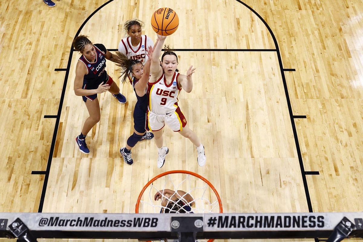 KK Arnold, Serah Williams, Talia Von Oelhoffen, and more can't contain their excitement as Geno Auriemma's UConn lands major transfer portal target
