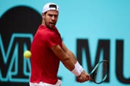 Khachanov plays a backhand in the Mutua Madrid Open - Day Eight - Source: Getty