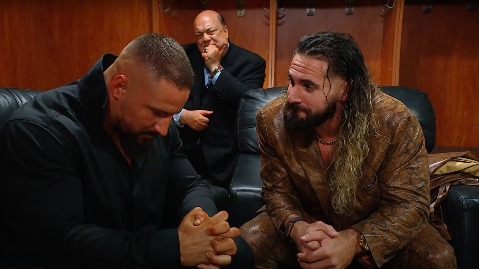 Bron Breakker (left), Paul Heyman (background), and Seth Rollins (right) [Image Credits: WWE