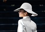 Zendaya turns heads at the 2025 Met Gala in a white 3-piece Louis Vuitton bridal-inspired suit