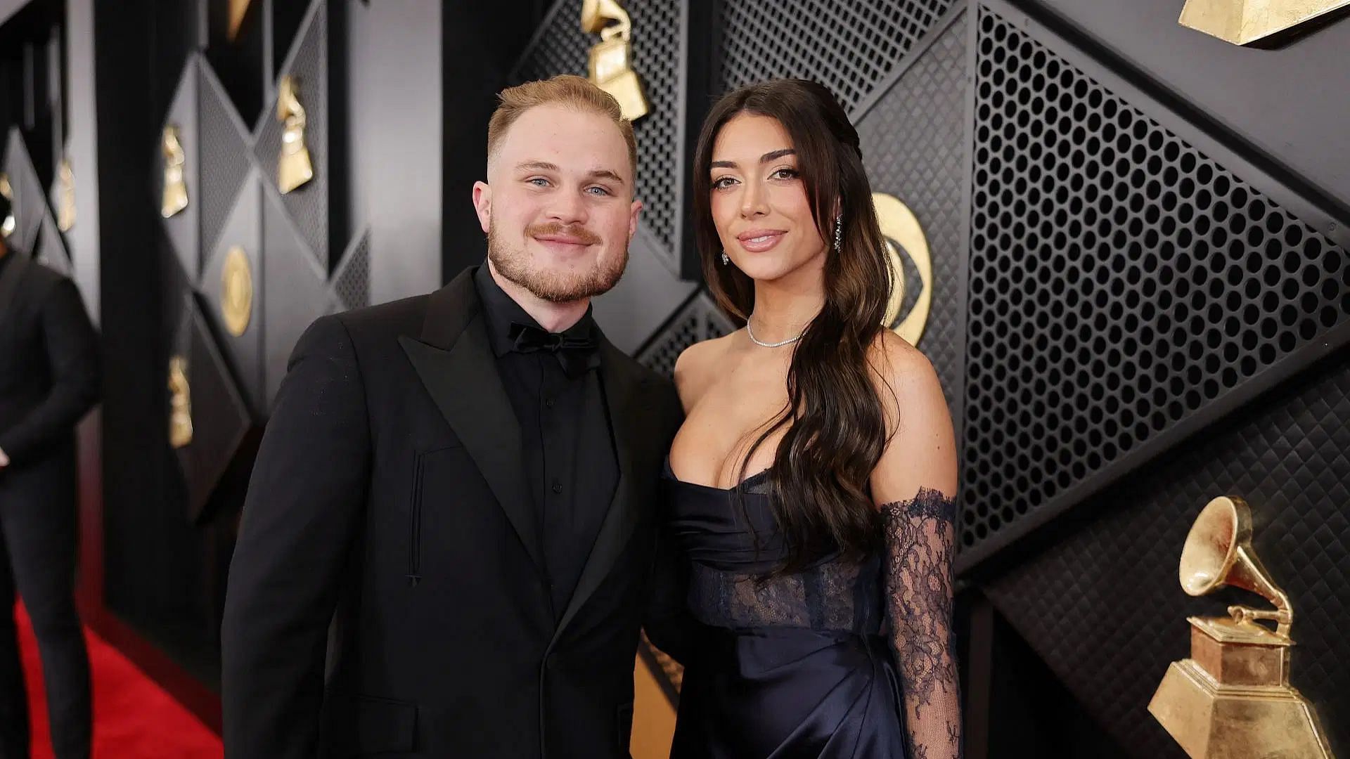 Brianna &quot;Chickenfry&quot; LaPaglia and Zach Bryan at the 66th GRAMMY Awards (Image via Getty)