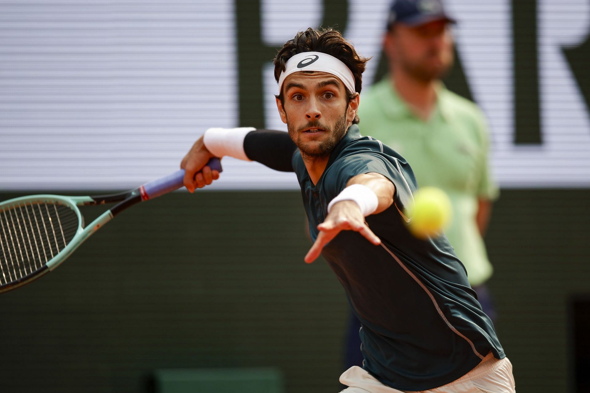 Lorenzo Musetti hits a forehand | Image Source: Getty