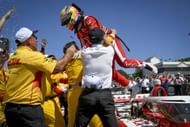 Alex Palou celebrates with his team after the 2025 XPEL Grand Prix at Road America - Source: Getty