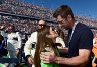 Danica Patrick with Aaron Rodgers at the Monster Energy NASCAR Cup Series 60th Annual Daytona 500 - Source: Getty