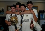 Tom Latham, Tim Southee, Devon Conway and Trent Boult of New Zealand celebrate winning in the dressing rooms after winning the ICC World Test Championship Final between India and New Zealand at The Ageas Bowl on June 23, 2021 in Southampton, England. (Photo by Gareth Copley-ICC/ICC via Getty Images)