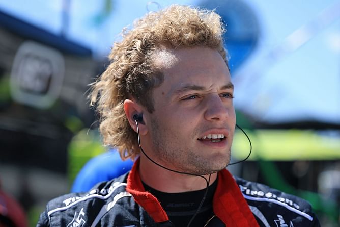 "Doing this for Marlyne": Santino Ferrucci chugs fan's beer, remembers deceased IndyCar sponsor after Road America podium